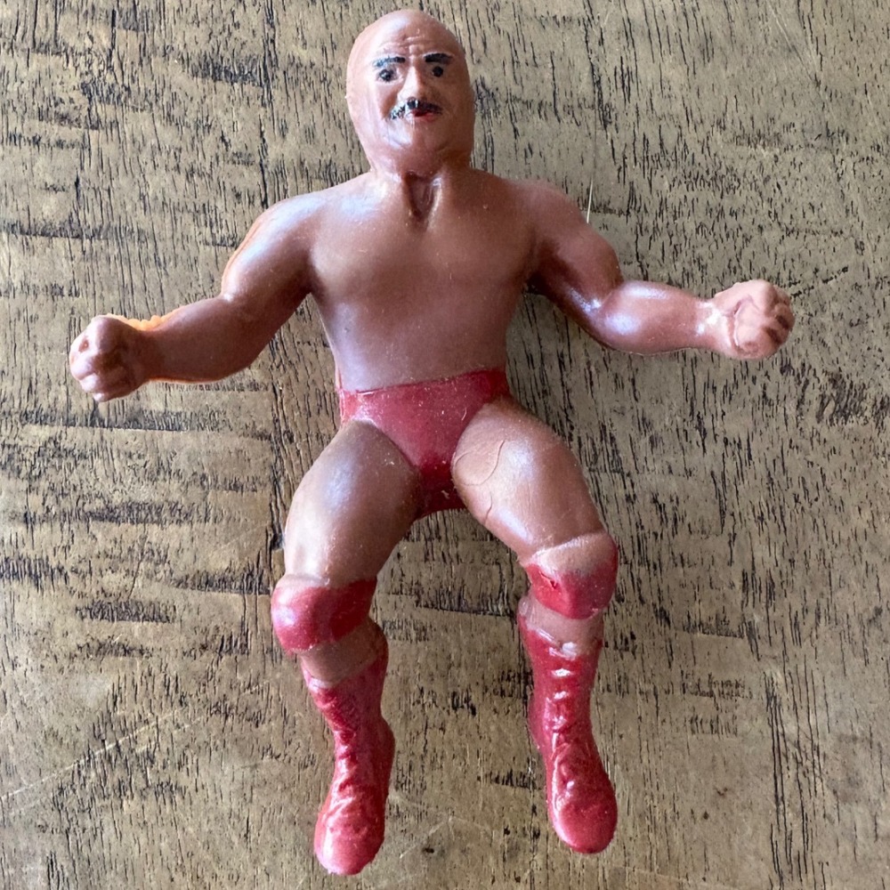 Abdullah Butcher Rubber Wrestler Finger Puppet Figure Red Trunks Mustache Bald